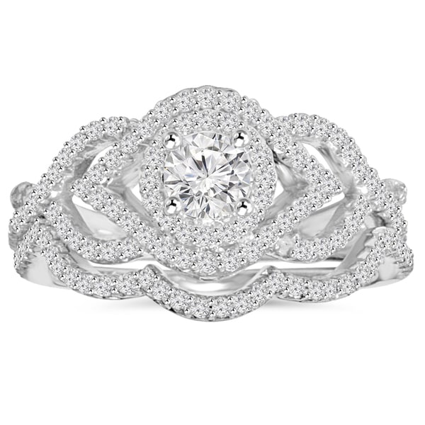 Intertwined engagement and wedding rings