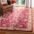 Handmade Hereditary Burgundy/ Gold Wool Rug (9' x 12')