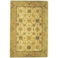 Handmade Heirloom Ivory/ Gold Wool Rug (6' x 9')