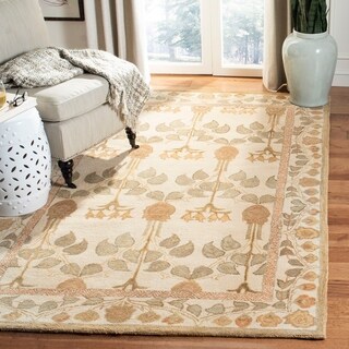 Handmade Ancestral Tree Ivory/ Green Wool Rug (4' x 6')