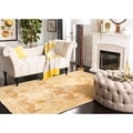 Handmade Nomadic Ivory/ Gold Wool Rug (3' x 5')