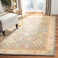 Handmade Legacy Light Blue Wool Rug (5' x 8')