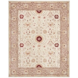 Handmade Timeless Ivory/ Sand Wool Rug (9' x 12')