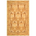 Handmade Ancestral Tree Ivory/ Gold Wool Rug (6' x 9')