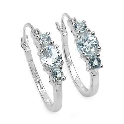 Malaika Sterling Silver Round-cut Blue Topaz 3-stone Hoop Earrings