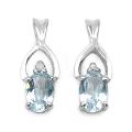 Sterling Silver Oval-cut Blue Topaz and Diamond Accent Earrings