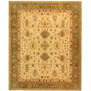 For sale Handmade Heirloom Ivory/ Light Green Wool Rug (9'6 x 13'6)