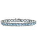 Sterling Silver Oval-cut Blue Topaz and Diamond Accent Bracelet