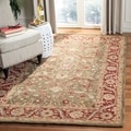 Handmade Ancestry Green/ Red Wool Rug (9' x 12')