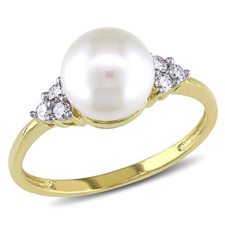 Golden pearl engagement rings