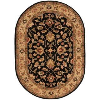Handmade Heritage Kerman Black/ Gold Wool Rug (4'6 x 6'6 Oval)