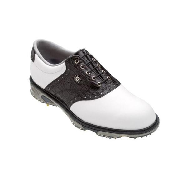 white and black golf shoes