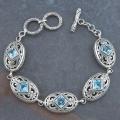 Sterling Silver 'Cawi' Blue Topaz Toggle Bracelet (Indonesia)
