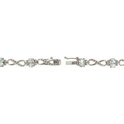 Glitzy Rocks Sterling Silver Diamond Accent Blue Topaz Infinity Bracelet