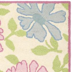 Handmade Children's Flowers Ivory New Zealand Wool Rug (5' x 8')
