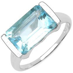 Malaika Sterling Silver Emerald-cut Blue Topaz Fashion Ring