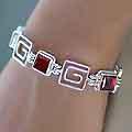 Sterling Silver 'Contrasts' Garnet Link Bracelet (Indonesia)