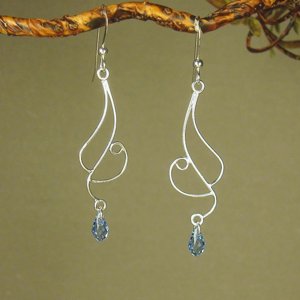 Jewelry by Dawn Long Curved Sterling Silver Earrings With Blue Crystal