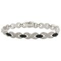 Fusion Black and Silvertone Diamond Accent 'X' Bangle Bracelet