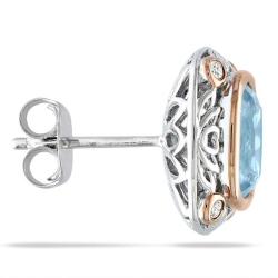 Sterling Silver Blue Topaz and 1/8ct TDW Diamond Stud Earrings (G-H, I3)