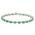 Sterling Silver Emerald and 1/6ct TDW Diamond Bracelet (G-H, I1-I2)