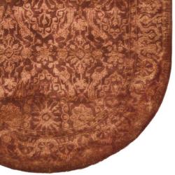 Handmade Silk Road Majestic Rust N. Z. Wool Rug (4'6 x 6'6 Oval)