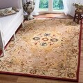 Hand-made Anatolia Gold/ Ivory Hand-spun Wool Rug (5' x 8')