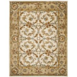Handmade Heritage Zabol Beige/ Gold Wool Rug (6' x 9')