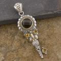 18k Gold and Silver Smoky Topaz and Citrine 'Butterfly Key' Pendant (Indonesia)