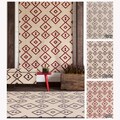 Mandara Handmade Geometric Pattern Flatweave Rug (5' x 7')