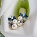 Miadora Sterling Silver Pearl Blue Topaz and Sapphire Earrings