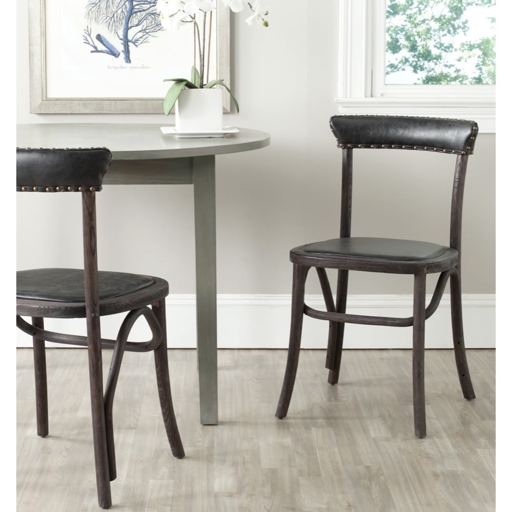 Safavieh Kenny Antique Black Side Chair (set Of 2) (BlackIncludes One (1) chairMaterials Stainless steel, oak wood and PUSeat dimensions 17.7 inches width and 18.9 inches depthSeat height 19 inchesDimensions 32.2 inches high x 17.7 inches wide x 18.9