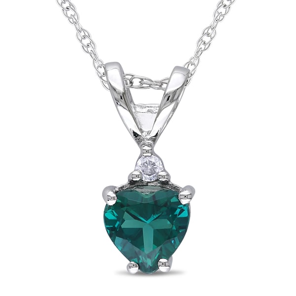 ... 10k White Gold Created Emerald and Diamond Accent Heart Necklace