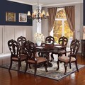 Freeport Brown 7-piece Pedestal Extending Oval Table Dining Set