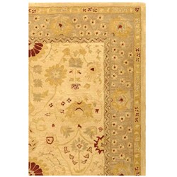 Handmade Timeless Ivory/ Sand Wool Rug (8' x 10')