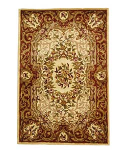 Handmade Classic Noble Ivory/ Rust Wool Rug (6' x 9')