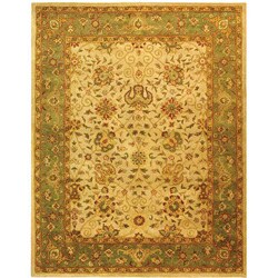Handmade Antique Mashad Ivory/ Green Wool Rug (8'3 x 11')