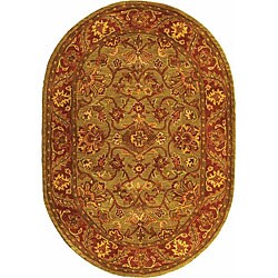Handmade Taj Mahal Green/ Rust Wool Rug (7'6 x 9'6 Oval)
