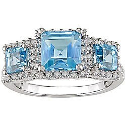 14k Gold Blue Topaz and 1/3ct TDW Diamond Ring