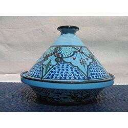 Sabrine Serving Tajine (Tunisia)