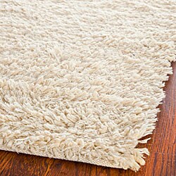 Hand-woven Posh Ivory Wool Shag Rug (7'6 x 9'6)