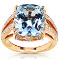 18k Gold Blue Topaz and 7/8ct TDW Diamond Ring (G-H, VS1-VS2)
