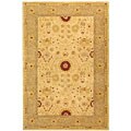 Handmade Timeless Ivory/ Sand Wool Rug (6' x 9')