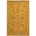 Handmade Antique Isfan Dark Gold/ Light Green Wool Rug (5' x 8')