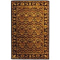 Handmade Treasured Dark Plum Wool Rug (5' x 8')
