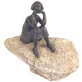Girl Thinking on Stone Garden Accent