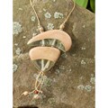 Free indicative facts on Handmade abstract Cow Natural Hardwood and Resin Abstraction Necklace (Philippines)