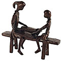Handcrafted Children Reading on Bench Sculpture