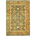 Handmade Legacy Blue/ Brown Wool Rug (4' x 6')