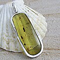 Sterling Silver Freeform Amber Wavy Frame Pendant (Lithuania)